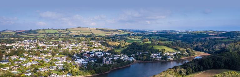 An aerial view of the village of Stoke Gabriel from the River Dart